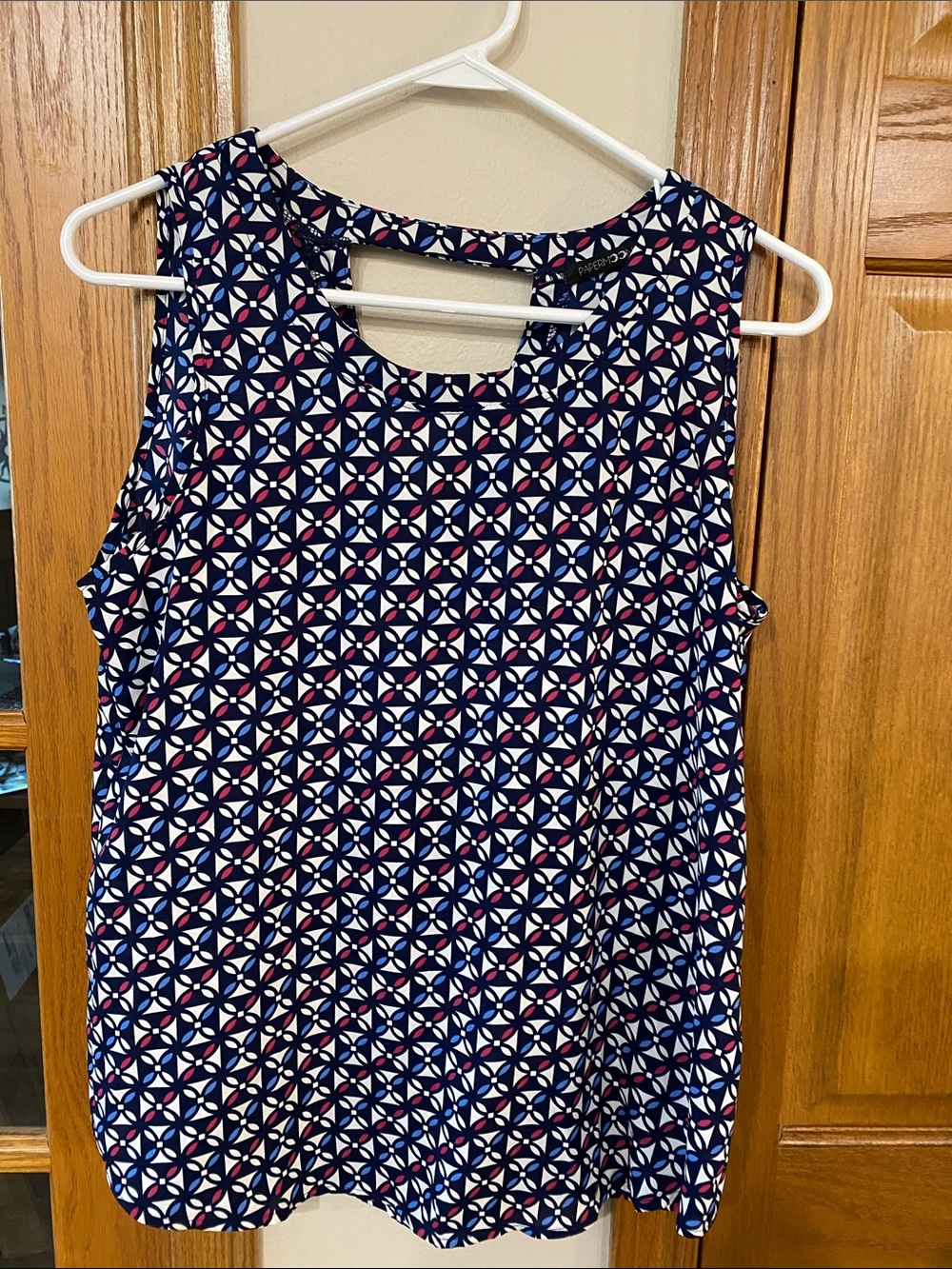 Navy Geometric Sleeveless Blouse with Pink Accents